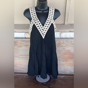 Theme black with cream strap detail size medium